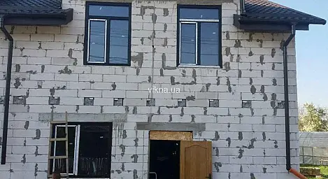 Вікна Rehau «антрацит» для будинку - головне фото